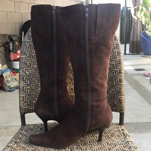 Real suede brown boots zips on the side. 3” heel.